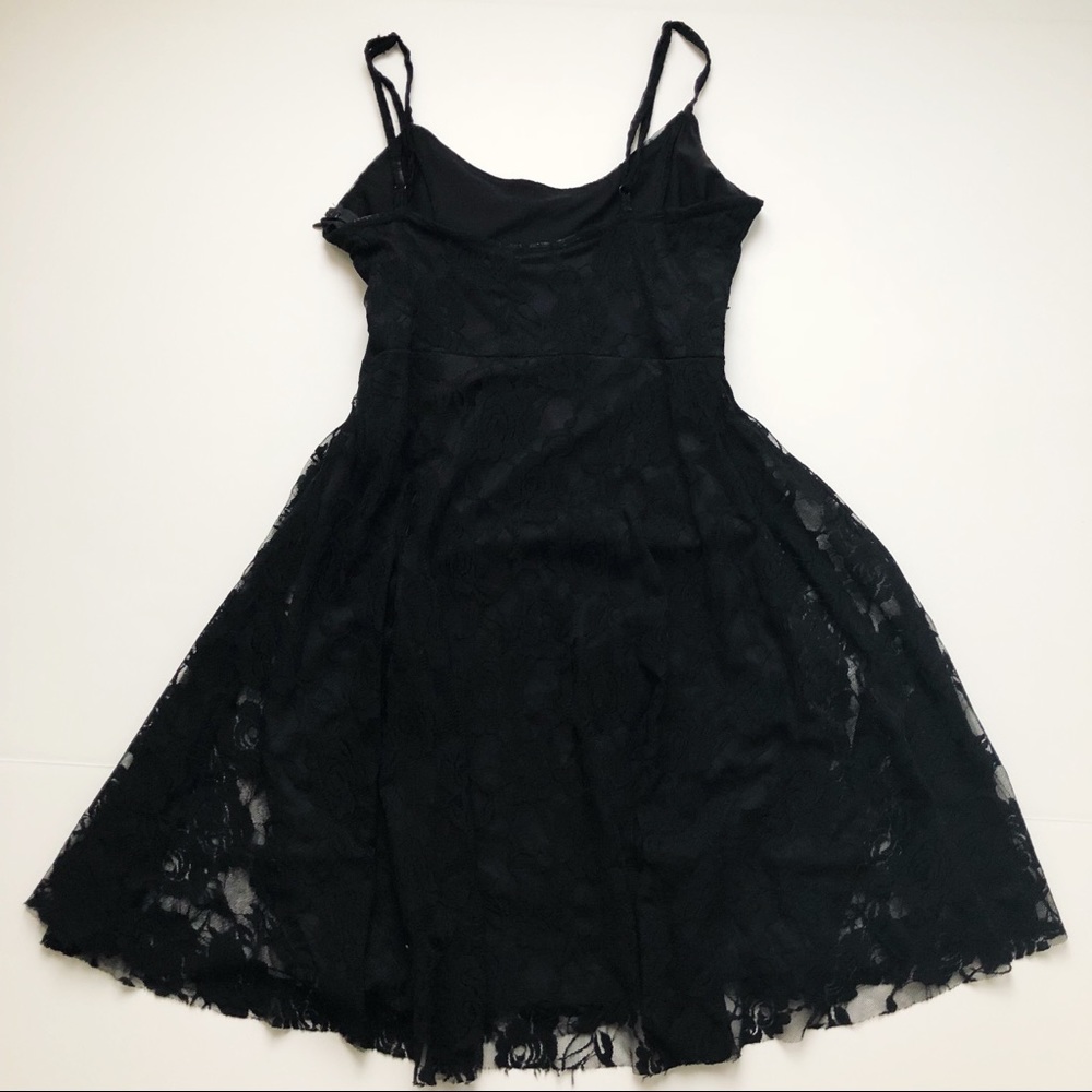 Black lace dress with floral detail. - Picture 6 of 8